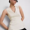 Αμάνικο τοπ με V-neck και πεπλούμ