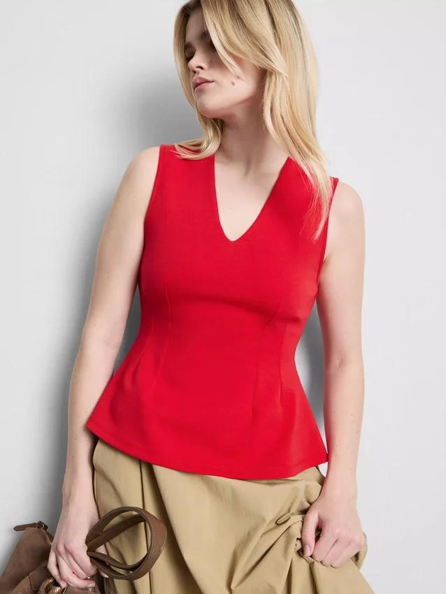 Αμάνικο τοπ με V-neck και πεπλούμ
