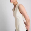Αμάνικο τοπ με V-neck και πεπλούμ