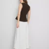 Αμάνικο τοπ με V-neck και πεπλούμ