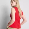 Αμάνικο τοπ με V-neck και πεπλούμ