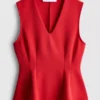 Αμάνικο τοπ με V-neck και πεπλούμ