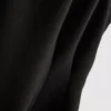 Αμάνικο τοπ με V-neck και πεπλούμ