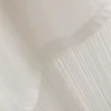 Ασύμμετρο μπλουζάκι από βαμβάκι με κρόσσια