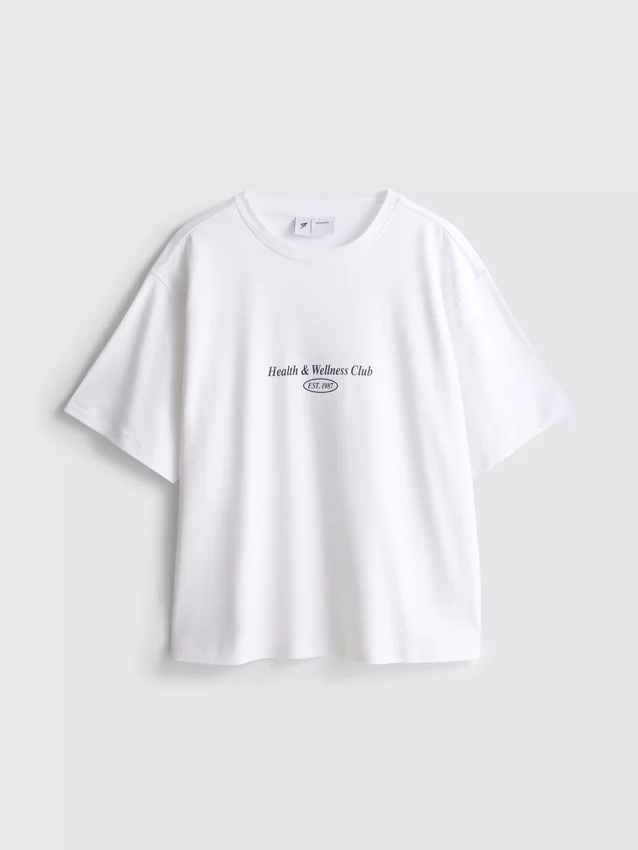 Χαλαρό βαμβακερό T-shirt με γραφικά