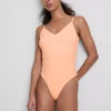 Κορμάκι με λουράκια και V-neck