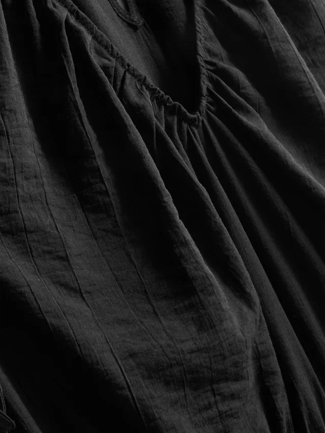 Ολόσωμη φόρμα με V-neck και φαρδιά πόδια