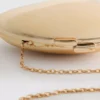 Οβάλ τσάντα crossbody Paula Echevarría σε μεταλλικό χρώμα
