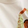 Reyna Noriega, φαρδύ βαμβακερό πουκάμισο