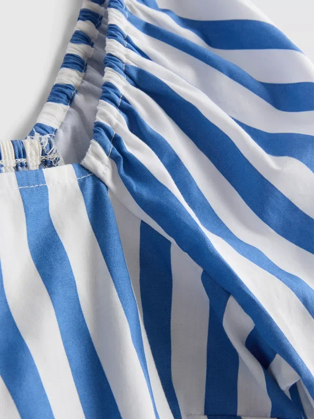 Ριγέ μπλούζα με φουσκωτά μανίκια και ανοιχτή πλάτη