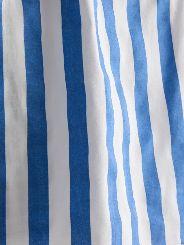 Ριγέ μπλούζα με φουσκωτά μανίκια και ανοιχτή πλάτη