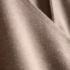 Στενή μπλούζα με V-neck και μεταλλικά στοιχεία