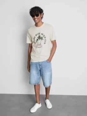 T-shirt με γραφικό «Paradise Beach»