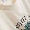 T-shirt με γραφικό «Paradise Beach»
