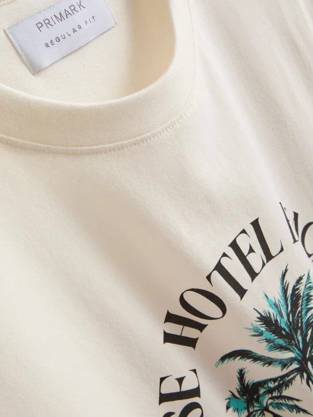 T-shirt με γραφικό «Paradise Beach»