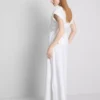 The Edit λινό μπλουζάκι με V-neck και περιτύλιξη