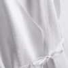 The Edit λινό μπλουζάκι με V-neck και περιτύλιξη