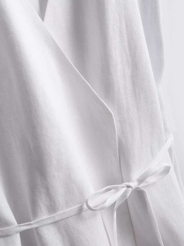 The Edit λινό μπλουζάκι με V-neck και περιτύλιξη