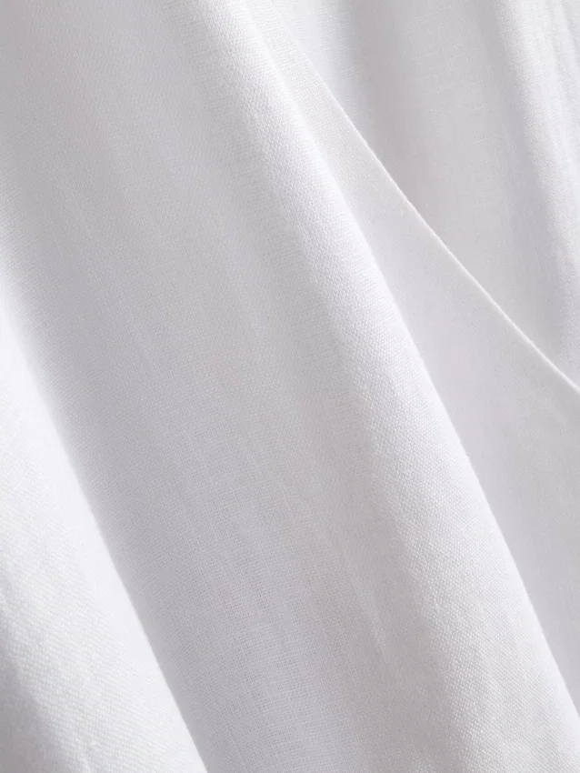 The Edit λινό μπλουζάκι με V-neck και περιτύλιξη