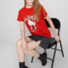 Βαμβακερό φανελάκι Hello Kitty με χαλαρή εφαρμογή και μοτίβο φράουλας