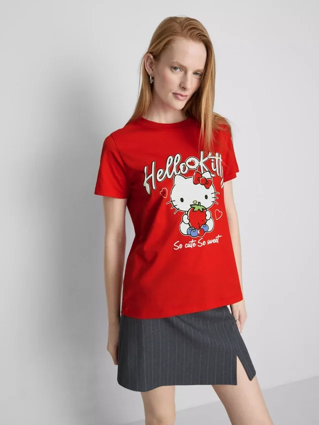 Βαμβακερό φανελάκι Hello Kitty με χαλαρή εφαρμογή και μοτίβο φράουλας