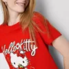 Βαμβακερό φανελάκι Hello Kitty με χαλαρή εφαρμογή και μοτίβο φράουλας