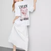 Βαμβακερό φαρδύ μπλουζάκι τύπου «boyfriend» με γραφικά