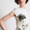 Βαμβακερό παιδικό μπλουζάκι με floral τύπωμα