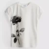 Βαμβακερό παιδικό μπλουζάκι με floral τύπωμα