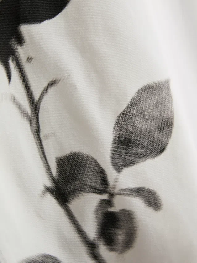 Βαμβακερό παιδικό μπλουζάκι με floral τύπωμα